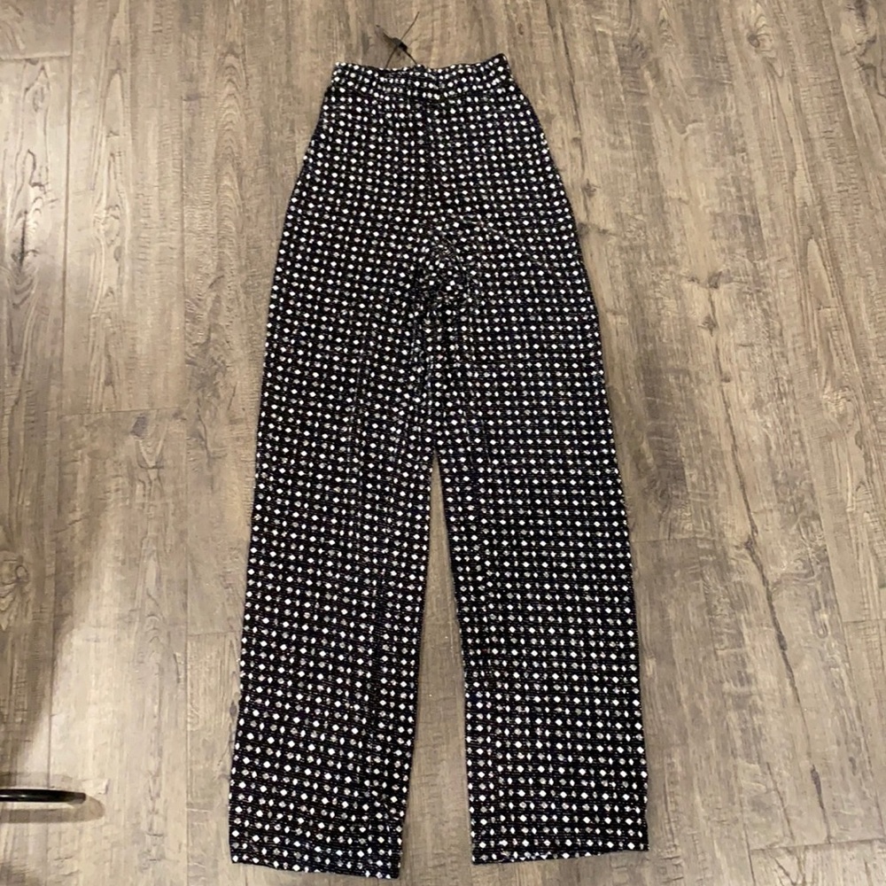 Perfect fit - hugs at waist then goes straight down. Brand new!